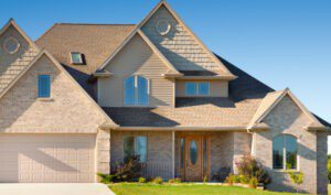 A house with a garage and a driveway.